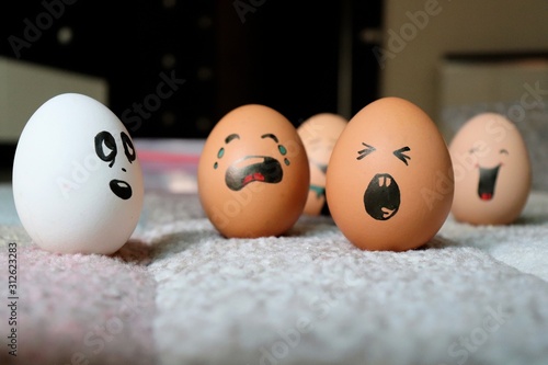 Funny and cute eggs faces for Easter. colorful Easter eggs