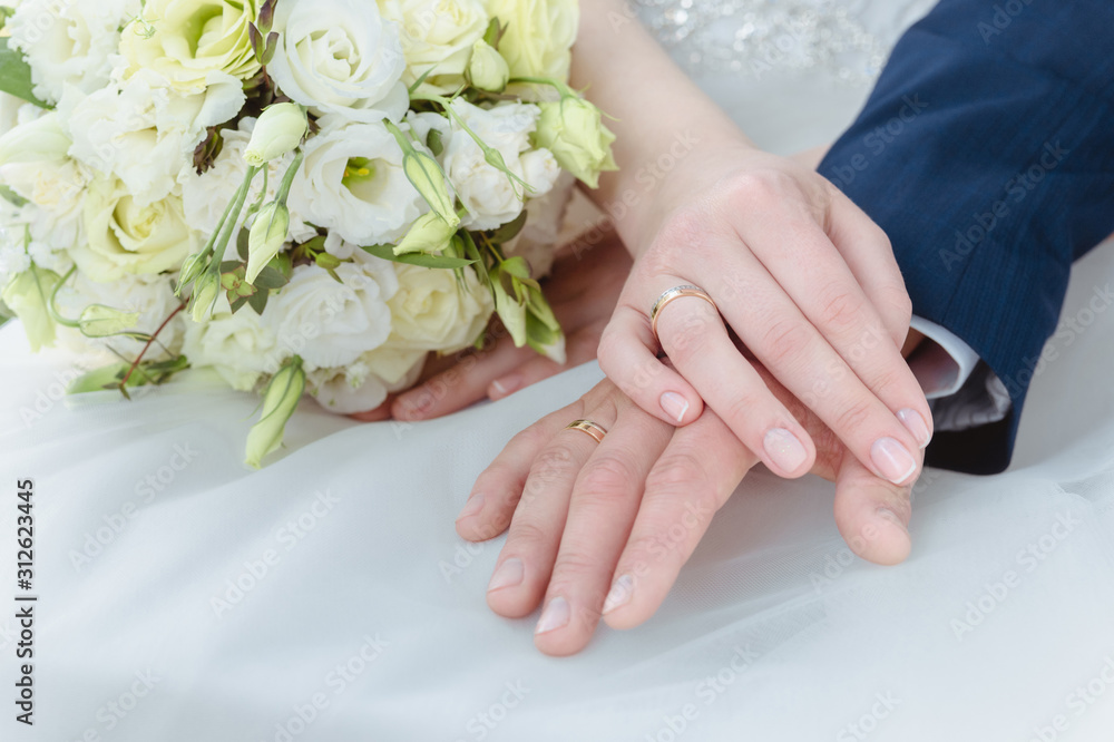 Wedding couple bride and groom holding hands Wedding couple bride and groom holding hands