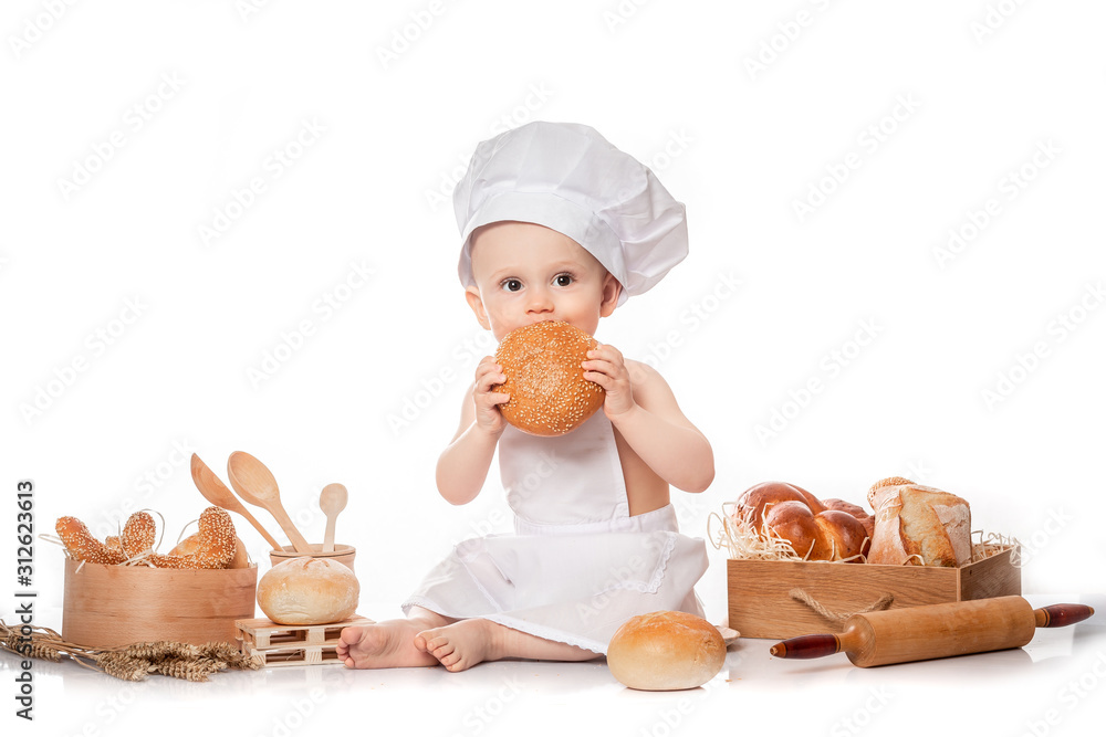 Little baby chef with bread. isolated on white. big size resolution. Food banner for text or design. Cooking child lifestyle concept Little baby chef with bread. isolated on white. big size resolution. Food banner for text or design. Cooking child lifestyle concept