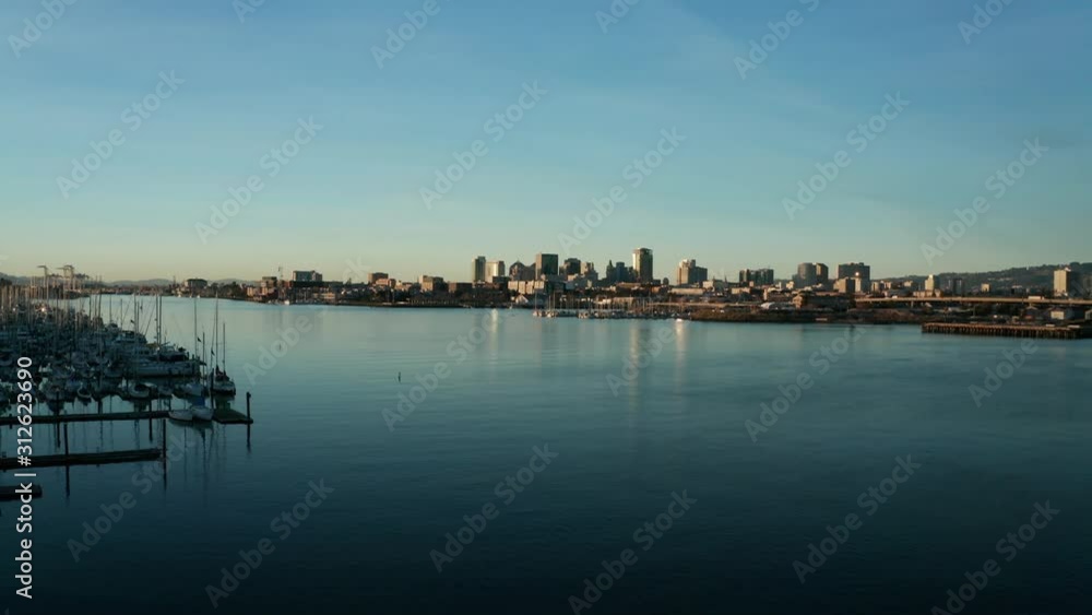 A golden sunset across the cities shadows and deep water marina. A golden sunset across the cities shadows and deep water marina.
