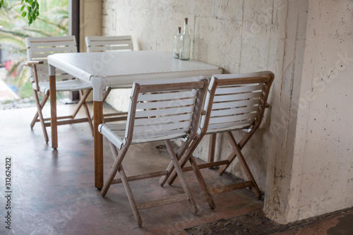 White tables and chairs in Cafe