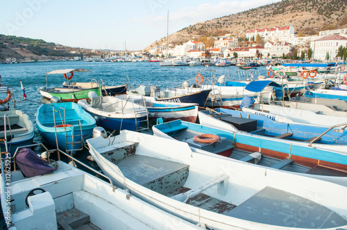 Balaklava, Crimea -November, 6, 2019. Many boats in tiny harbor of Balaklava.