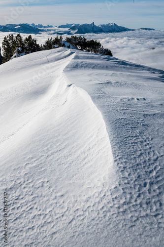 snow drifts on Niederhorn and Mount Stockhorn © schame87