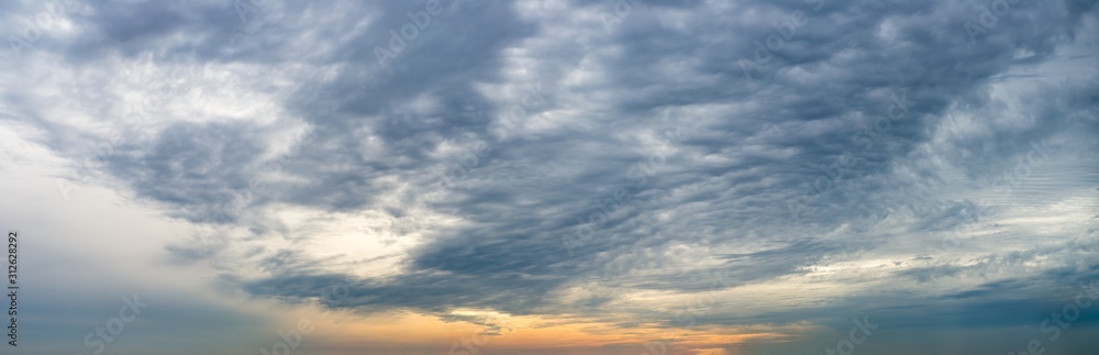 Fototapeta premium Fantastic clouds at sunrise