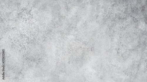 Old grungy texture, grey cement or concrete wall. Banner or video orientation 16:9