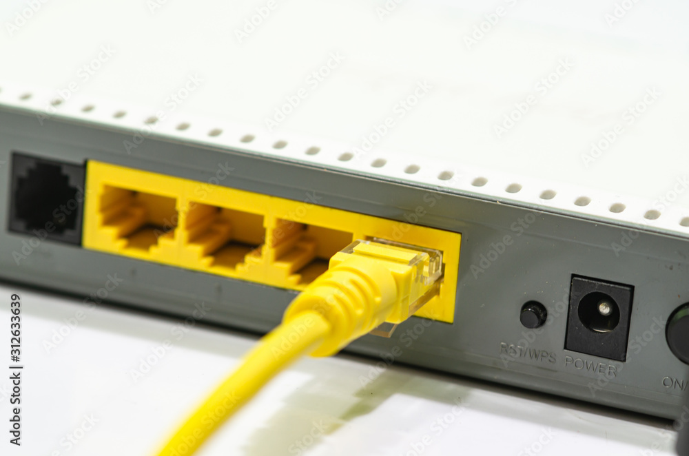 Wireless modem router with cable connecting On a white background Wireless modem router with cable connecting On a white background