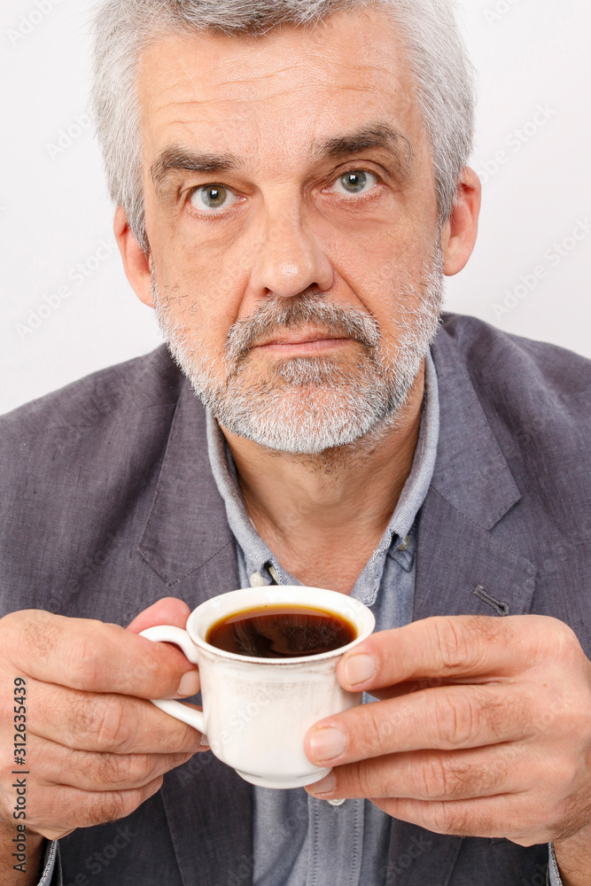 Handsome man drinking coffee Handsome man drinking coffee
