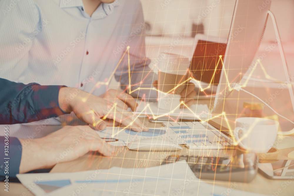 Multi exposure of chart with man typing on computer in office on background. Concept of hard work. Multi exposure of chart with man typing on computer in office on background. Concept of hard work.