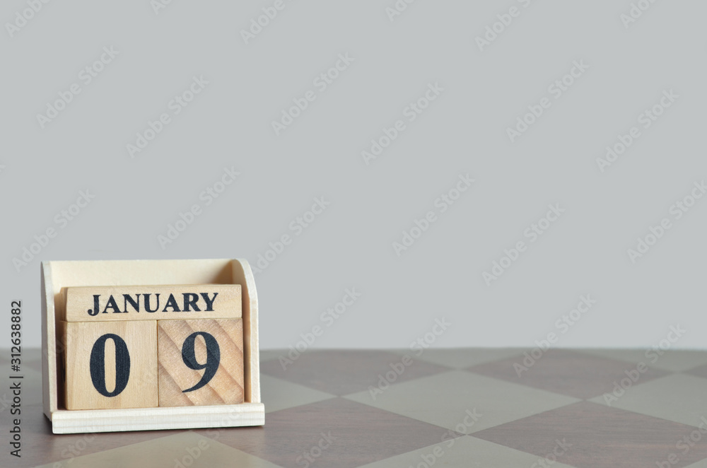 January 9, Empty background with number cube on the table. January 9, Empty background with number cube on the table.