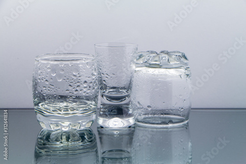 glass of water on blue background