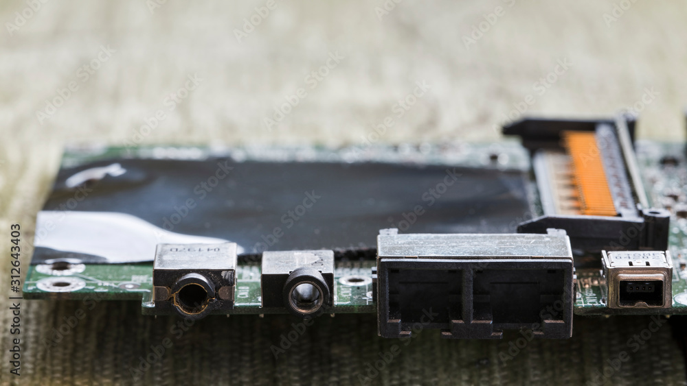 Audio connectors on laptop motherboard. Stock Photo | Adobe Stock