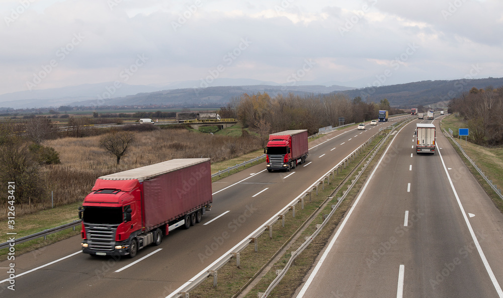 Columns of trucks on the road Columns of trucks on the road