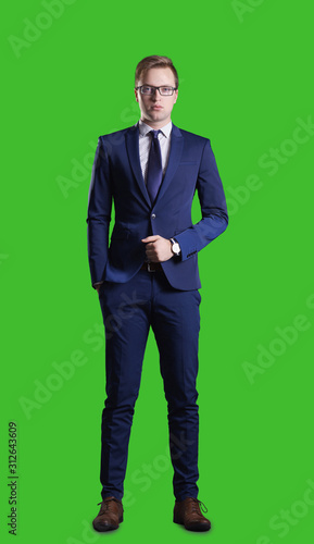Obraz na plátně Businessman standing over chroma key background
