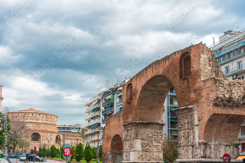Fototapeta Naklejka Na Ścianę i Meble -  THESSALONIKI, GREECE - November 30, 2019: Arch of Galerius or Kamara and the Rotunda are neighbouring early 4th-century AD monuments in the city of Thessaloniki, Greece