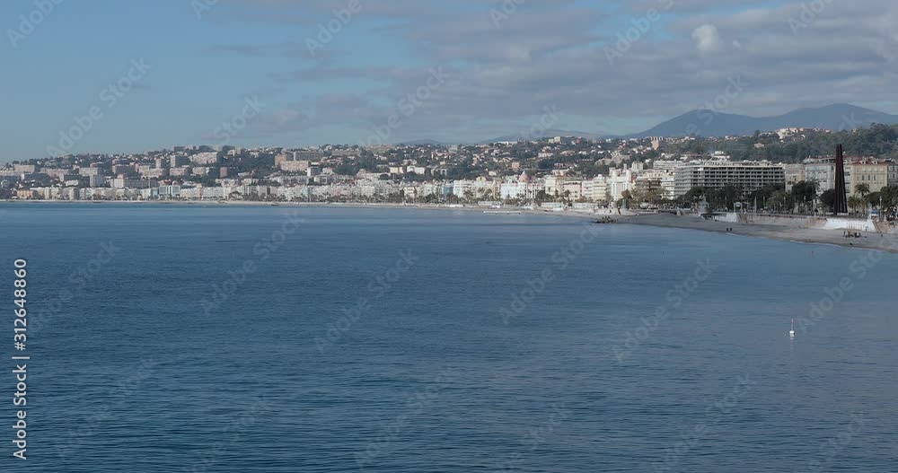 Beach and Promenade at Sunny Winter Day Mediterranean Sea in Nice France
