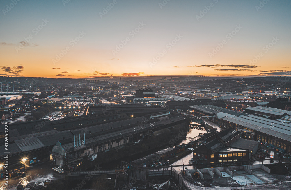 Industrial Sheffield City aerial view at twilight sunset showing the warehouses and factories along the River Don