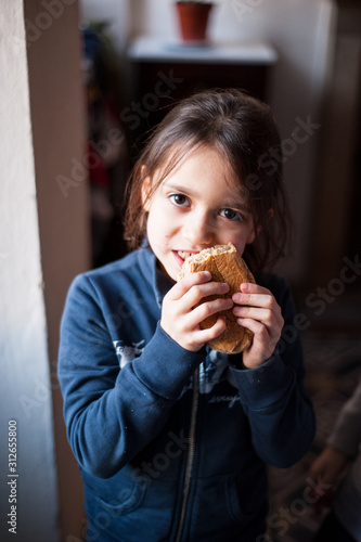 girl eating sandwich