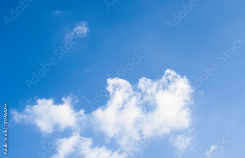 Blue sky with soft white cloudy atmosphere is clear and clean.