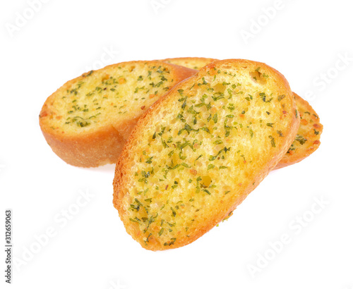 Garlic and herb bread slices on white background.