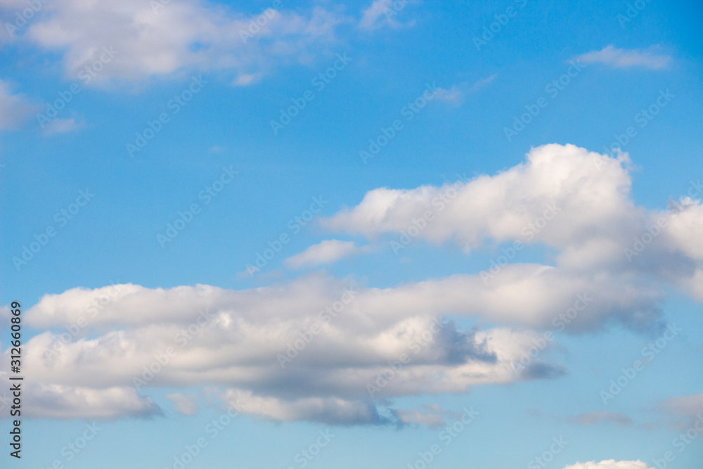 Bright blue sky with white clouds for background or wallpapers Bright blue sky with white clouds for background or wallpapers