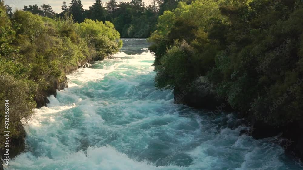 SLOWMO - Raging Waikato river with whitewater rapids on Huka Falls, New Zealand SLOWMO - Raging Waikato river with whitewater rapids on Huka Falls, New Zealand