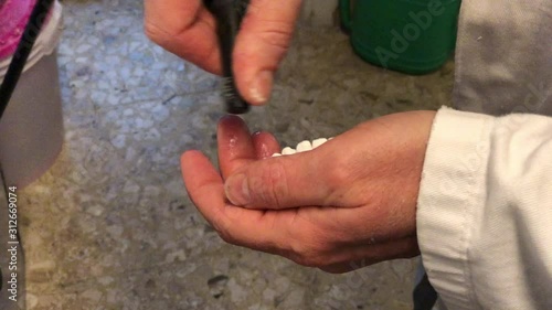 Dental technician working on brackets