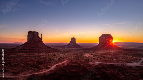 Beautiful sunrise over the red rocks of Monument Valley in Arizona