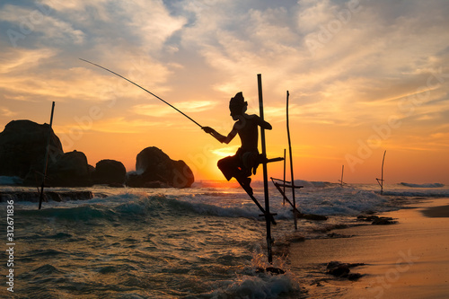 Tablou canvas Stilt Fishermen of Sri Lanka