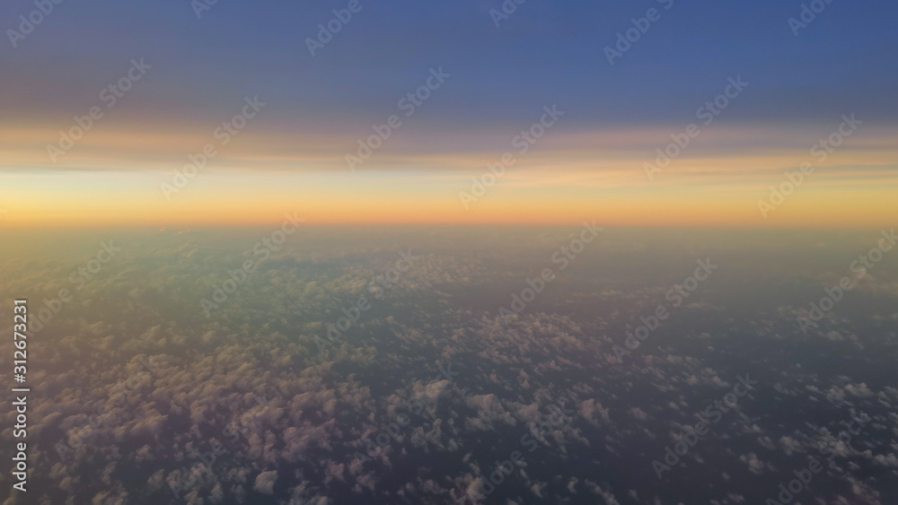 Sunset sky aerial view from airplane. Sunset sky aerial view from airplane.