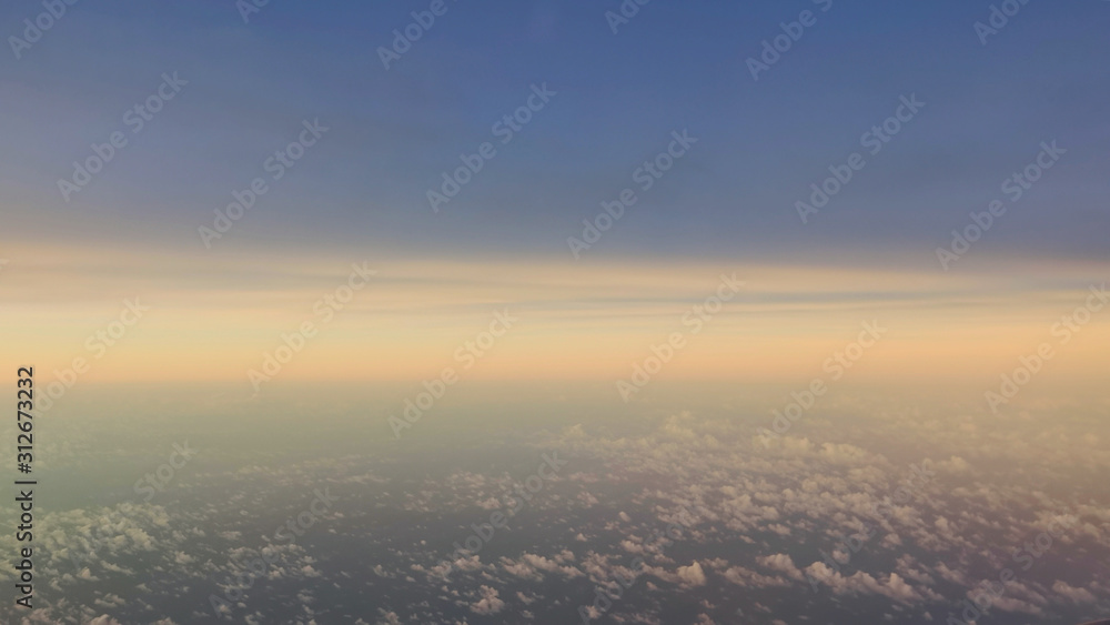 Sunset sky aerial view from airplane. Sunset sky aerial view from airplane.