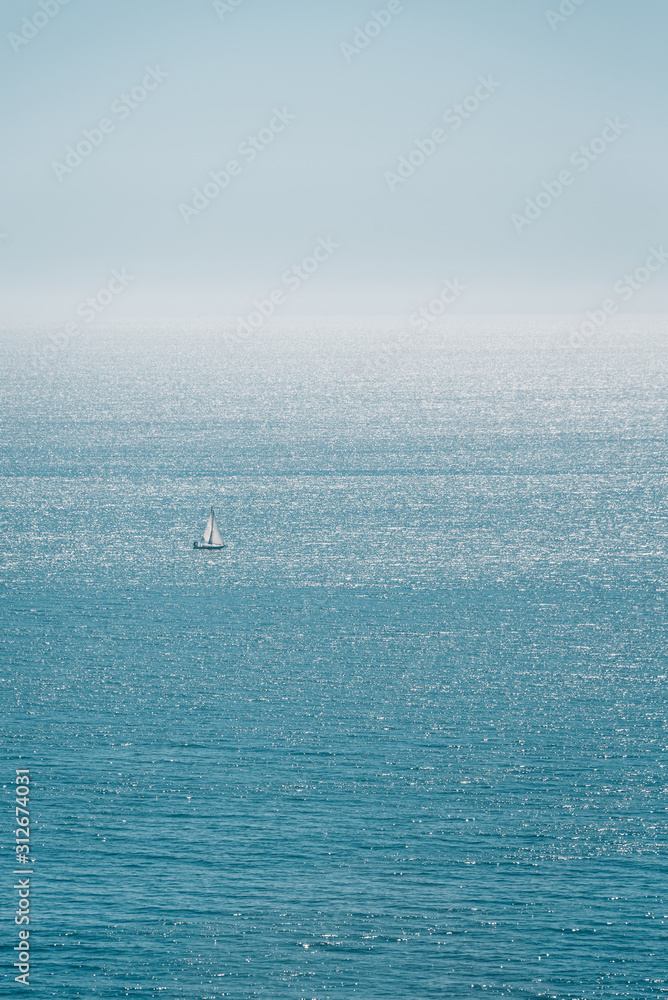 Sailboat in the Pacific Ocean, seen from Pacific Palisades, California