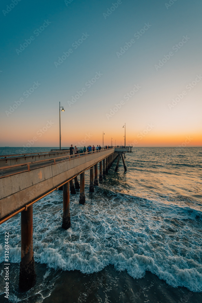 The pier in Venice Beach at sunset, in Los Angeles, California