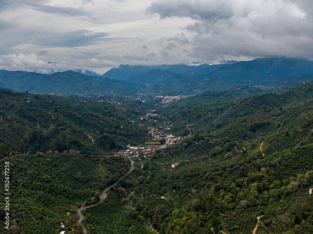 Naklejka premium Beautiful aerial view of the beautiful town of Santa Maria de Dota in Costa Rica -town in valley