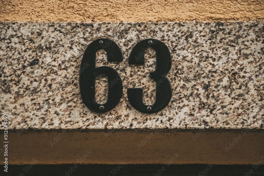 Vintage door numbers in old street Stock Photo | Adobe Stock