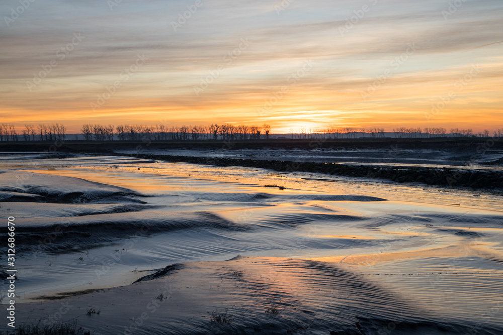 Beautiful sunset at Mont saint Michel , Normandy, France.