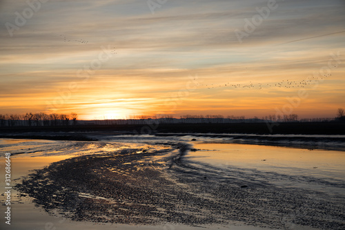 Beautiful sunset at Mont saint Michel , Normandy, France. © Popa