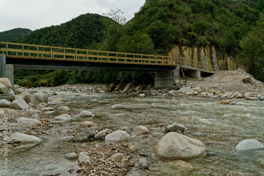 Temporary bridge over the Matiri river west branch, Kahurangi National Park, New Zealand. Temporary bridge over the Matiri river west branch, Kahurangi National Park, New Zealand.
