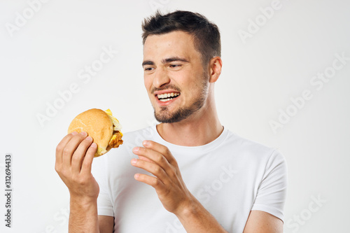 young man eating apple