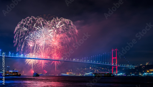 ISTANBUL, TURKEY. New Year 2020 Celebrations Around the Istanbul. Fireworks with Istanbul Bosphorus Bridge (15th July Martyrs Bridge). .