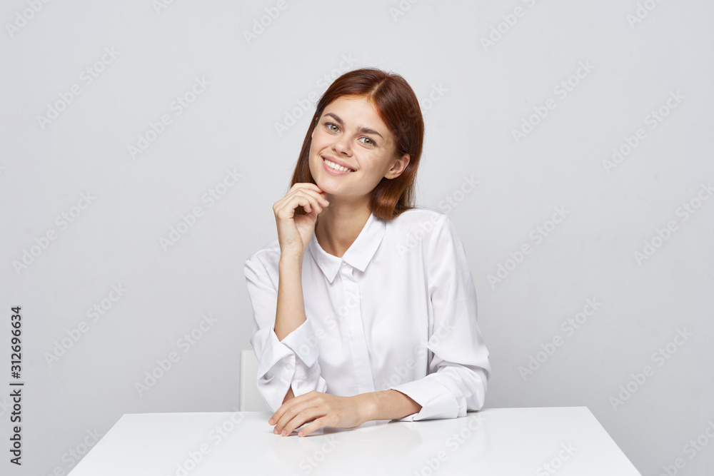 business woman sitting at desk with laptop business woman sitting at desk with laptop