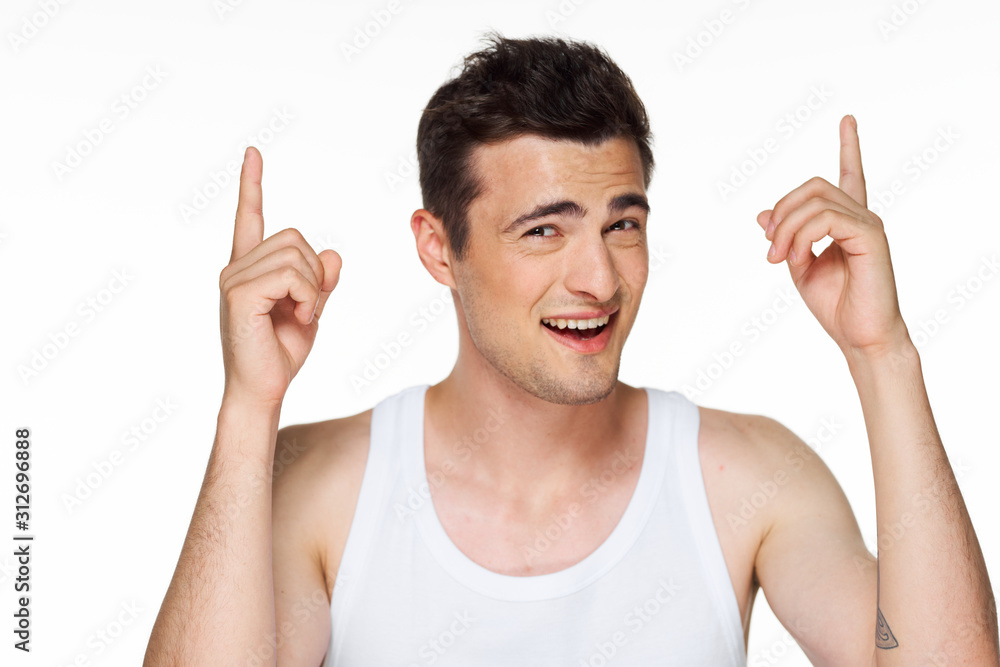 young man with hands up young man with hands up