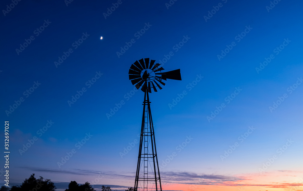 Windmill and Moon during Sunset Windmill and Moon during Sunset