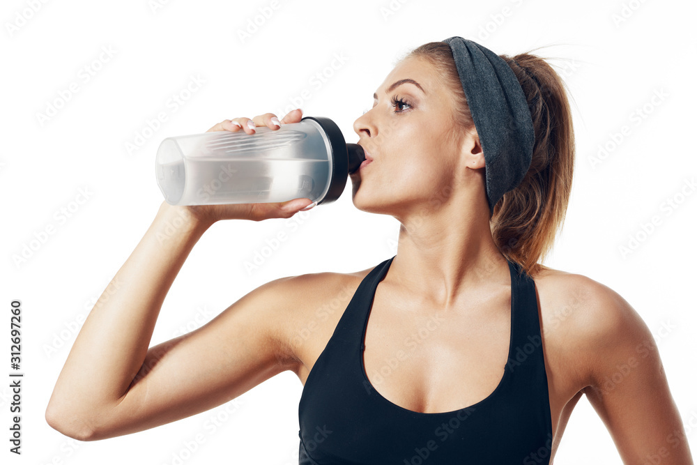 young woman with bottle of water young woman with bottle of water