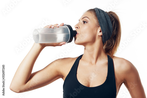 young woman with bottle of water