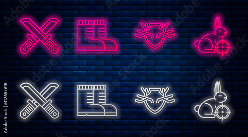 Set line Hunter boots, Deer antlers on shield, Crossed hunter knife and Hunt on rabbit with crosshairs. Glowing neon icon on brick wall. Vector