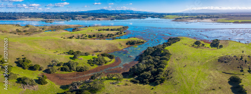 Fototapeta Naklejka Na Ścianę i Meble -  Aerial Panoramic View of Elkhorn Slough, Moss Landing, California. Elkhorn Slough is a 7-mile-long tidal slough and estuary on Monterey Bay in Monterey County, California. 