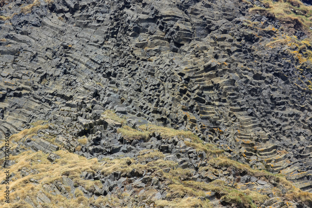 The texture of the basalt cave in Iceland closeup