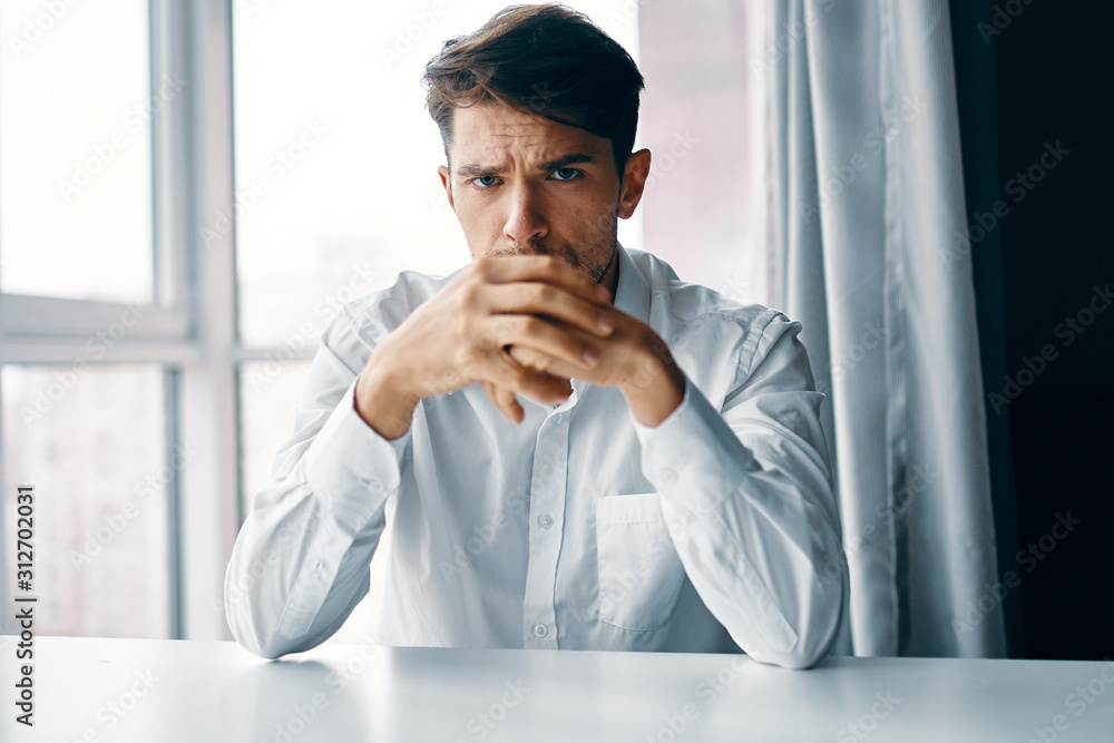 portrait of a businessman in office portrait of a businessman in office