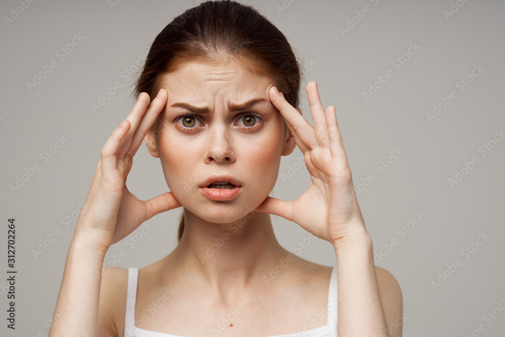 Fototapeta premium young woman with headache