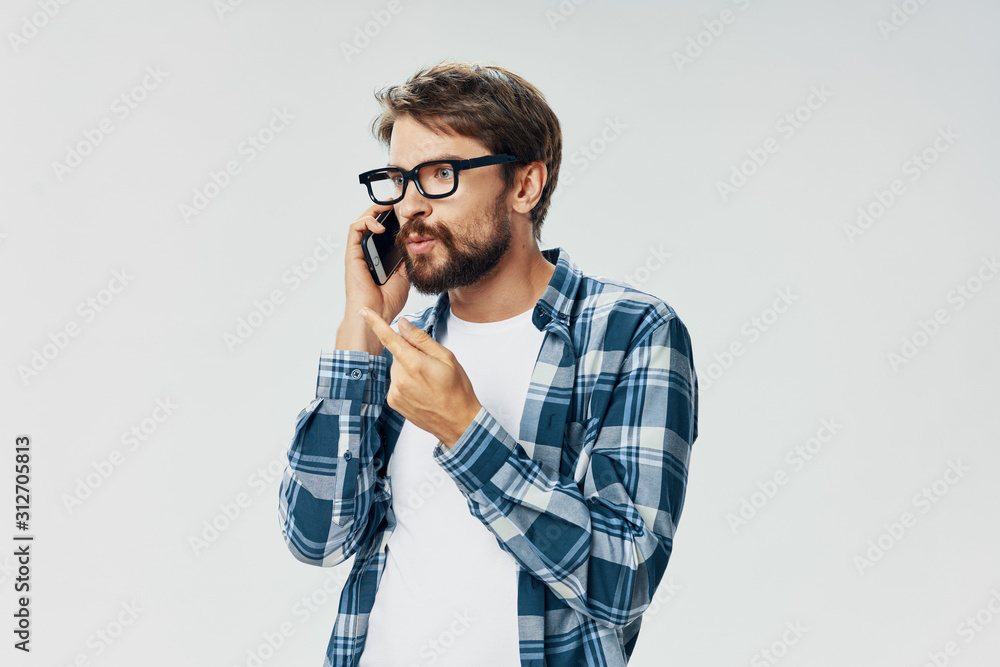 young man talking on the phone young man talking on the phone